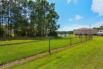 A fenced-in dog park at Crystal Lake in Pensacola, Florida.